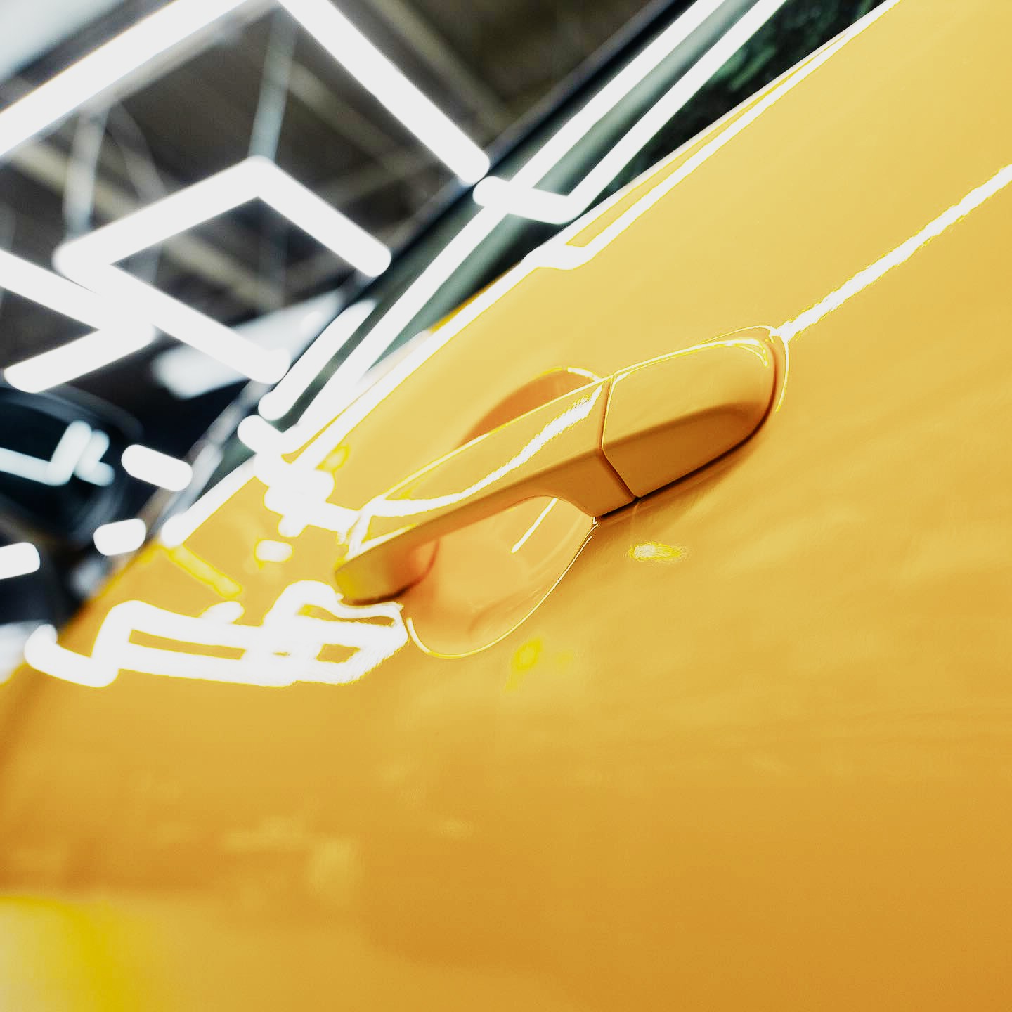Close wrap finish on a door handle under inspection lights
